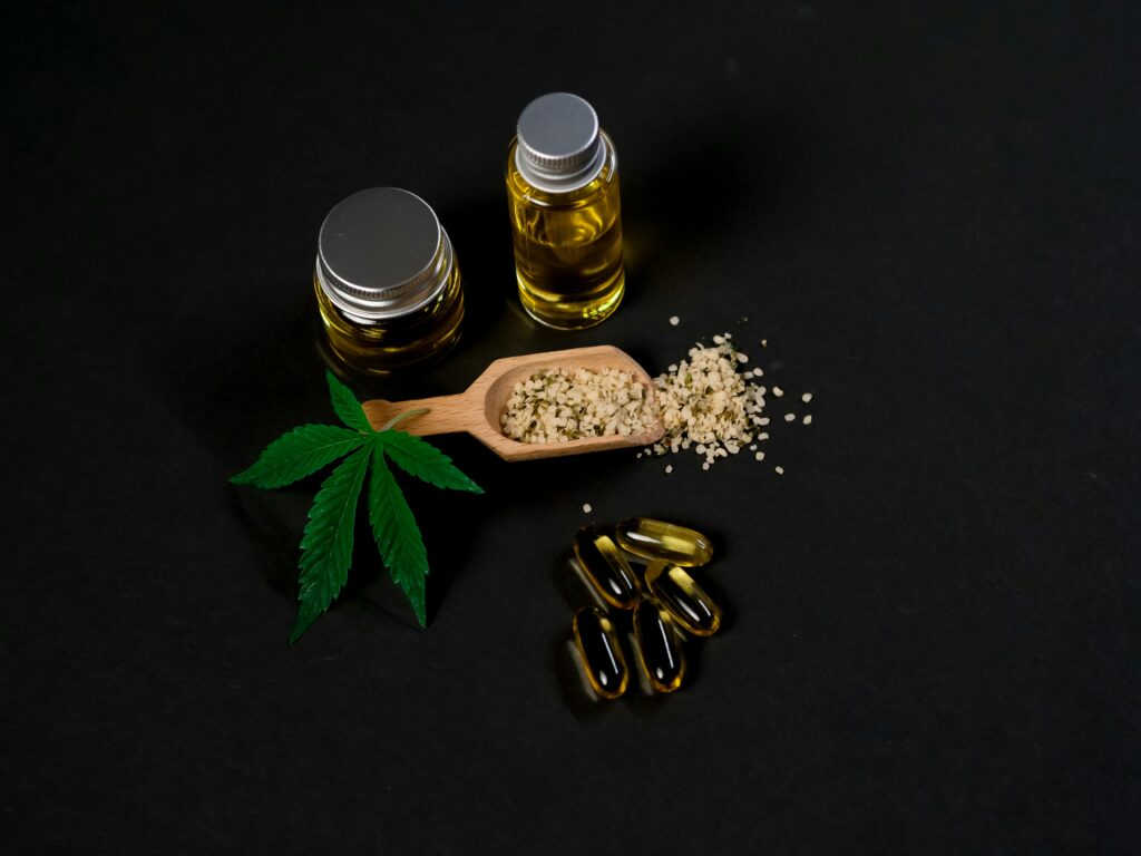 
A picture of CBD and CBN products with pills, oils, and granulated CBD